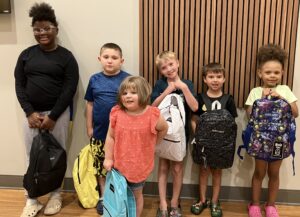 students with backpacks